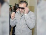 Un român care șantaja un preot din Italia, cu filmulețe în care întreținea relații sexuale cu minori, a fost arestat
