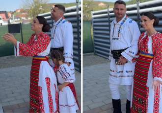 Georgiana Lobonț, nașă la Bistrița! Îmbracați în port popular, artista și soțul ei au botezat o fetiță | VIDEO