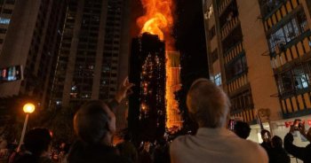 Bilanţul incendiului devastator din Hong Kong a crescut la 128 de morţi
